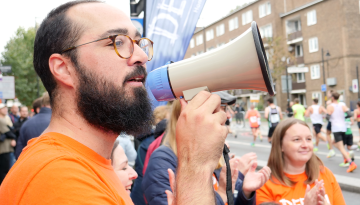 Depaul staff cheering London runners