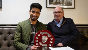 Chris holding his cricket award