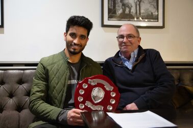 Chris holding his cricket award